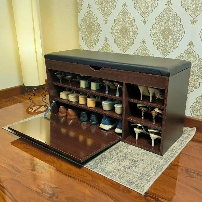 Shoe organizer with bench with shoe shelves and top compartment.