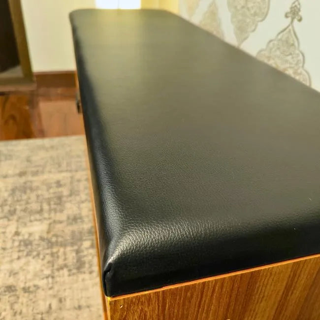 Shoe organizer with bench with shoe shelves and top compartment.