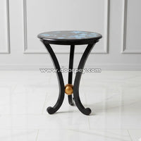 Black round wooden side table featuring hand painted blue floral artwork and elegant curved legs