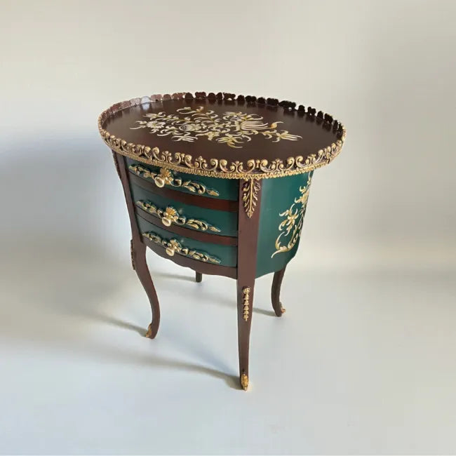 Emerald Crest end table with ornate drawers and emerald inlay