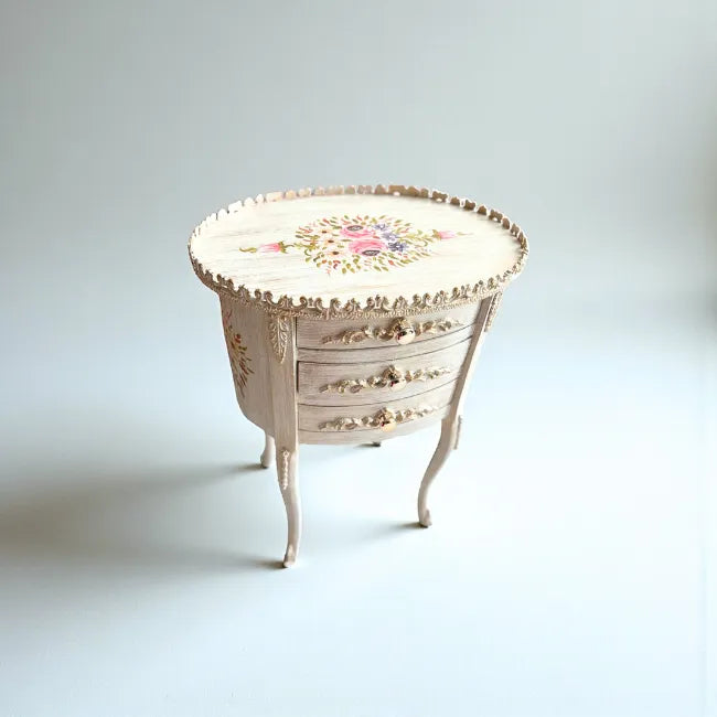 Floral Heirloom wooden table styled as a decorative side table in a classic home interior