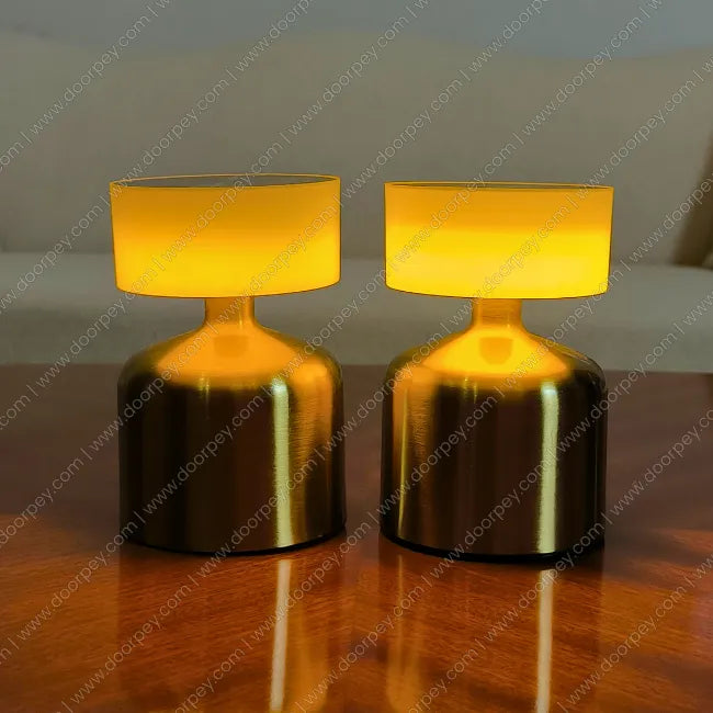 Golden Aura Cordless Table Lamp with a radiant gold finish and minimalist design for modern home lighting.