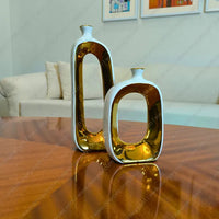 Elegant Golden Halo ceramic vase set with white and gold finish for sophisticated home decor styling