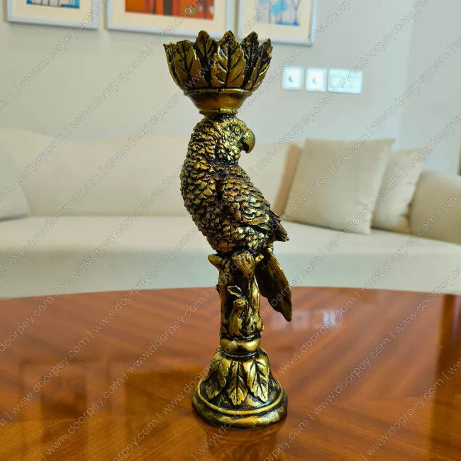 Detailed Golden Plume Parrot Candle Stand with dark antique finish decorative resin parrot for luxury home decor styling.