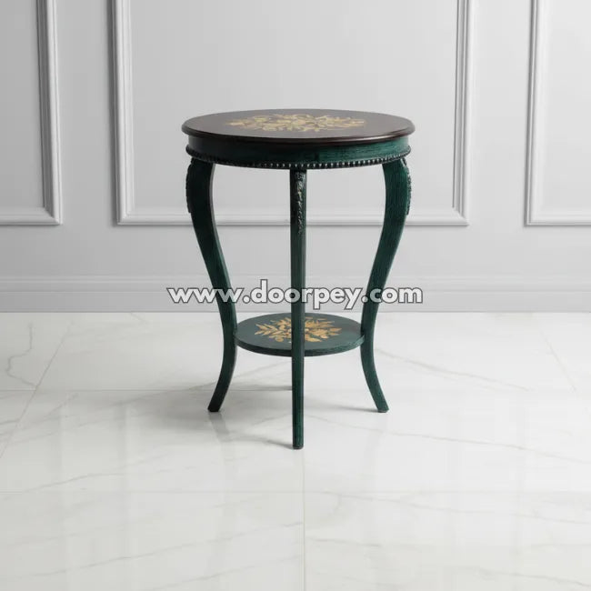 Small round hand painted wooden coffee table in emerald finish with decorative lower shelf