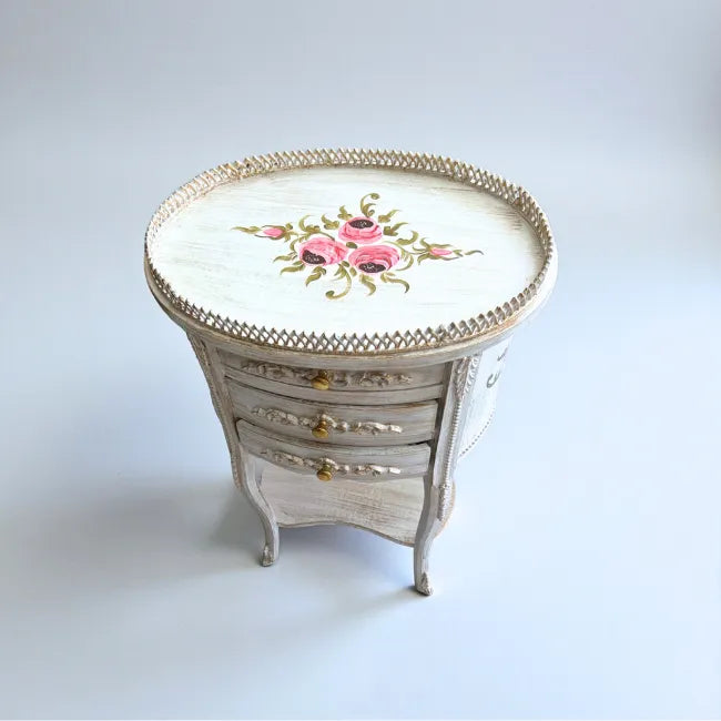 Ivory Heirloom wooden table styled as a decorative end table in a classic home interior