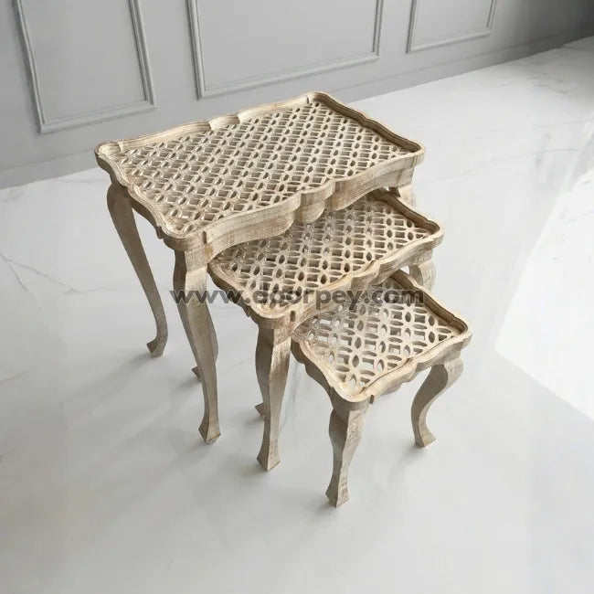 Ivory lattice wooden nesting table set with elegant carved design