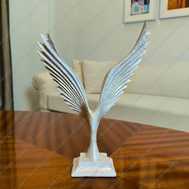 Elegant Majestic Wings Eagle Sculpture with distressed ivory finish for sophisticated home decor styling.
