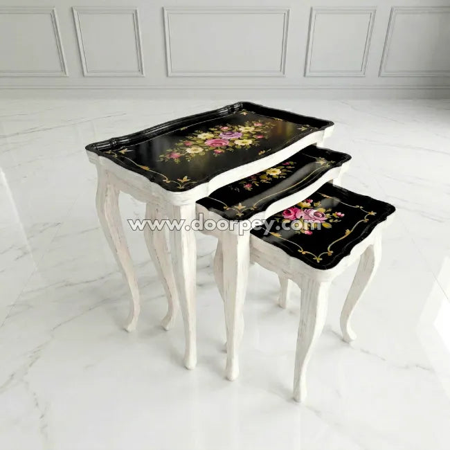 Petal Noir wooden nesting table used as decorative corner table