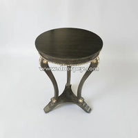 Round wooden side table crafted from kikar wood with decorative detailing and smooth round top