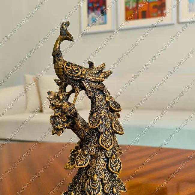 Luxury Royal Peacock resin sculpture with dark antique finish and detailed flowing feathers for elegant home decor.