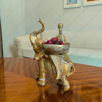 Elegant Savannah Empress Elephant Sculpture in Antique Gold finish, a sophisticated resin figurine for luxury home decor styling.