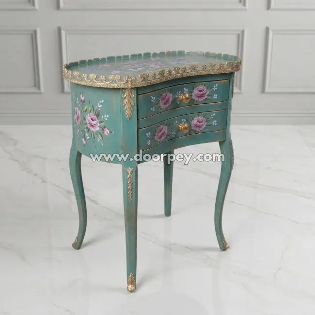 Decorative side table with floral patterns and gold accents on a white background