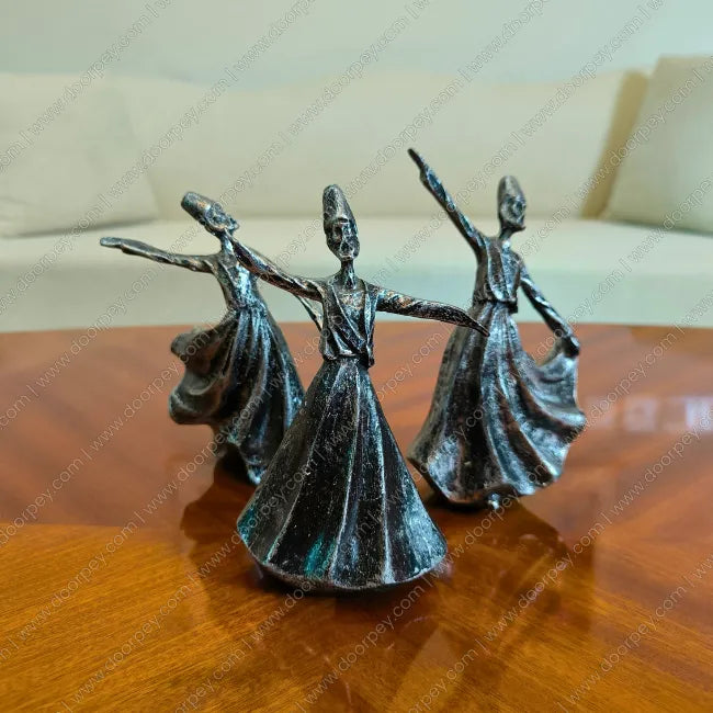 Detailed Whirling Dervish Resin Sculpture with an antique silver finish for elegant spiritual home decor styling on console tables and shelves.