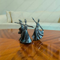 Elegant Whirling Dervish Resin Sculpture in an antique silver finish, a sophisticated resin figurine for spiritual home decor styling.