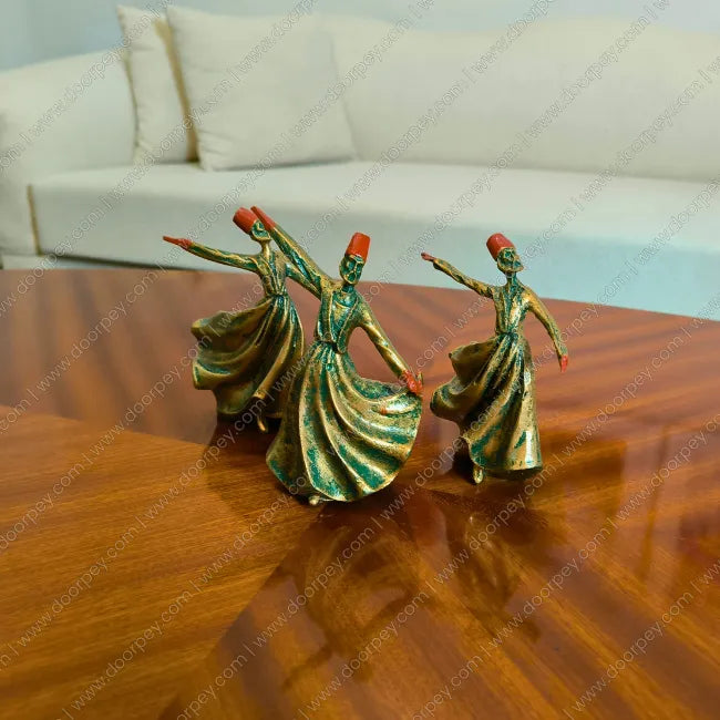 Detailed Whirling Dervish Resin Sculpture with a green patina bronze finish, a serene spiritual figurine capturing the Sufi dance for home decor styling.
