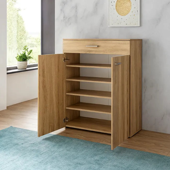 Shoe cabinet with open doors in a room with a window and plant.