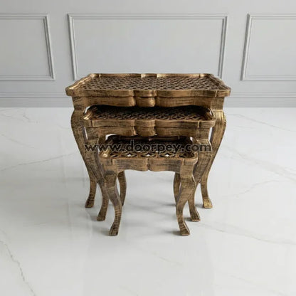 Antique lattice wooden nesting table used as decorative corner table