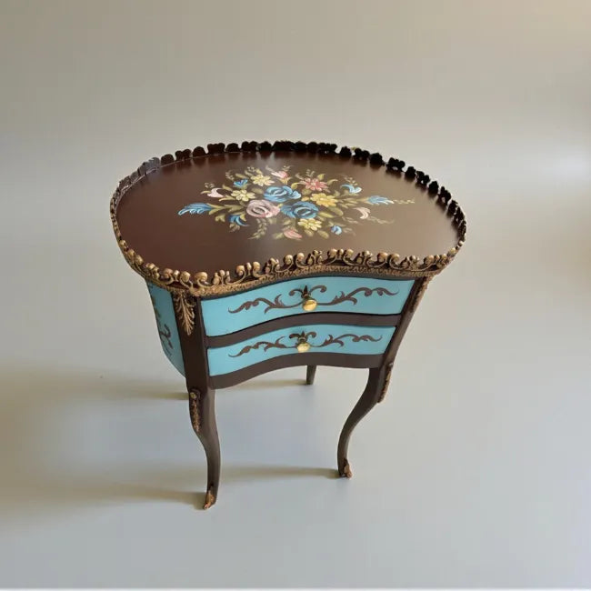 Azure Crest end table with ornate drawers and refined detailing