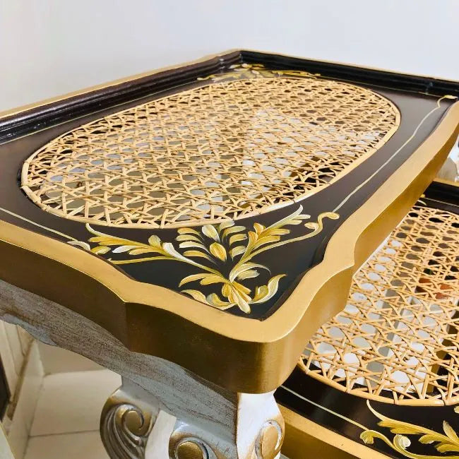 Space-saving black and gold nesting tables stacked neatly, perfect for compact and stylish interiors