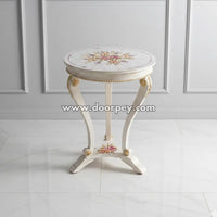 Cosmo Petals round hand painted accent table with floral artwork in white finish made from kikar wood