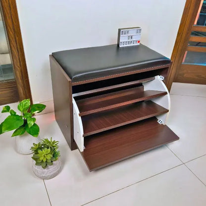 Side angled view of a compact shoe rack with the door open and three shelves.