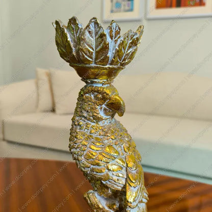 Elegant Golden Plume Parrot Candle Stand in Antique Gold finish, a sophisticated resin taper candle holder for luxury home decor styling.
