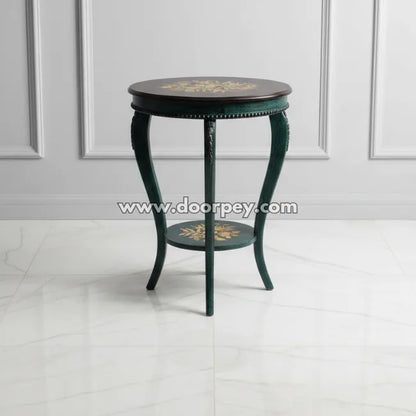Small round hand painted wooden coffee table in emerald finish with decorative lower shelf