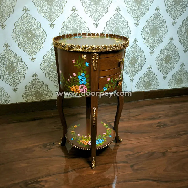 Side angle of hand painted wooden side table with golden accents and bottom shelf with online delivery