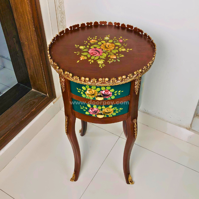 Top view of a wooden side table with gold accents