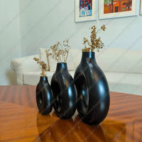 Elegant Noir Loop Decorative Vase Set with a black resin finish for modern minimalism home decor styling.