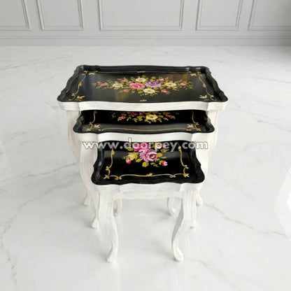 Petal Noir wooden nest table set with black floral painted top
