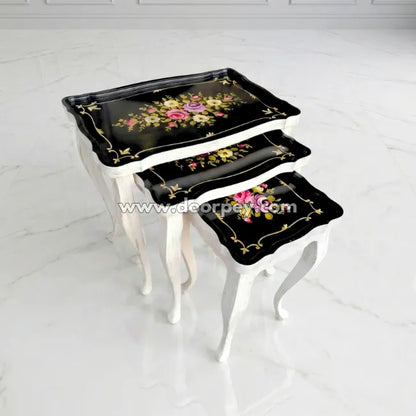 Petal Noir wooden nesting tables with hand painted floral design
