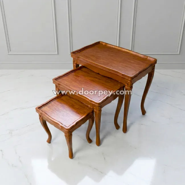 Regency wooden nesting table used as decorative corner table
