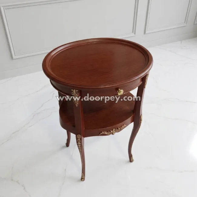 Wooden side table with decorative elements on a white floor and wall background