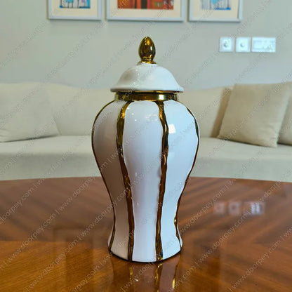 Detailed Royal Ivory Candy Jar Set with a smooth ivory finish, a sophisticated 2-piece ceramic jar collection perfect for elegant home decor styling.