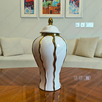 Detailed Royal Ivory Candy Jar Set with an ivory ceramic finish for elegant home decor styling on console tables and sideboards.
