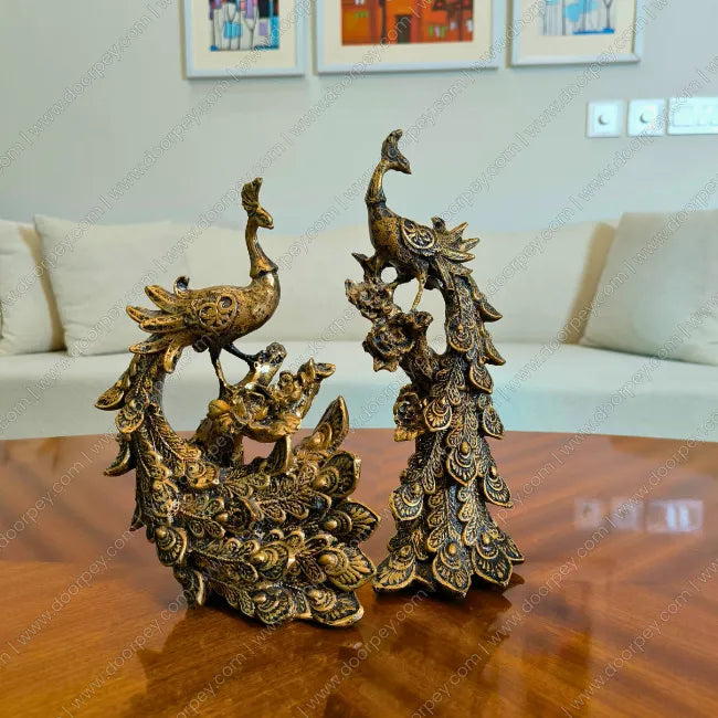 Detailed Royal Peacock resin sculpture with dark antique finish for elegant home decor styling.