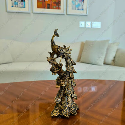 Detailed Royal Peacock resin sculpture pair with a dark antique finish for regal and prosperous home decor accents.