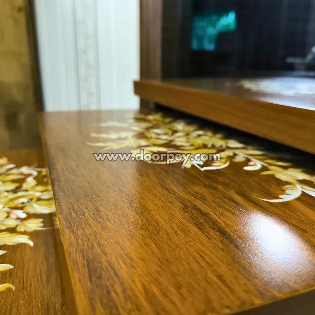 Close up shot of wooden nesting tables with handpainted patterns
