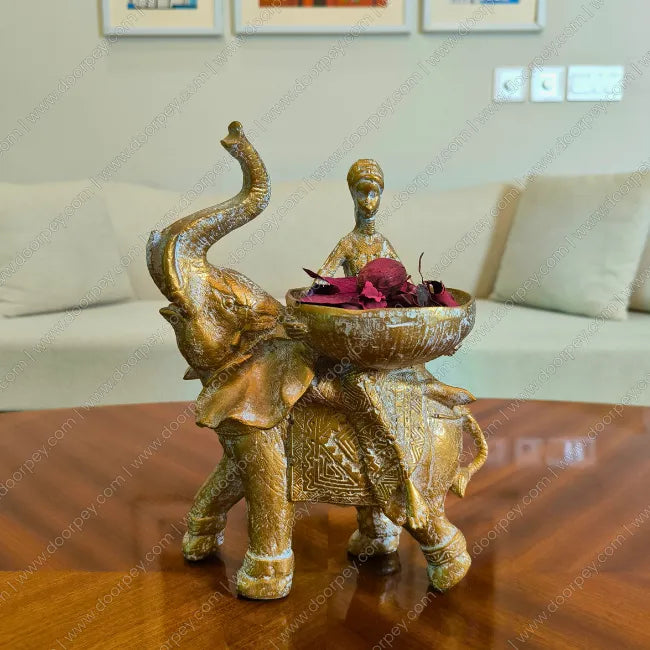 Savannah Empress Elephant Sculpture with antique gold finish decorative resin elephant and female figure for luxury home decor styling