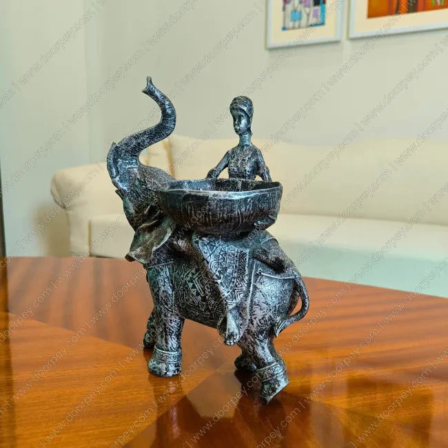 Detailed Savannah Empress Elephant Sculpture with a distressed antique silver finish for elegant home decor styling on console tables and shelves.