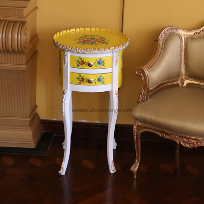 Front view of a wooden side table next to a chair.