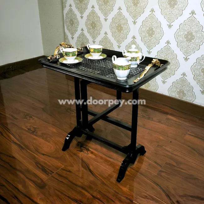 Space saving folding tray table suitable for lounge dining or serving guests