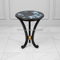 Twilight Blossom round hand painted accent table with blue floral design on black wooden top made from kikar wood