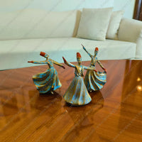 Elegant Whirling Dervish Resin Sculpture in an aged gold patina finish, a sophisticated resin figurine for spiritual home decor styling.