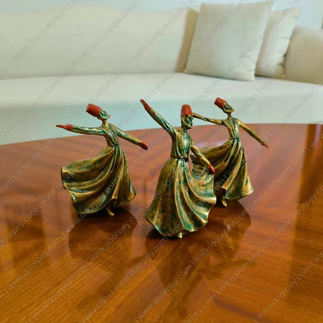 Detailed Whirling Dervish Resin Sculpture with a green patina bronze finish for elegant spiritual home decor styling on console tables and shelves.
