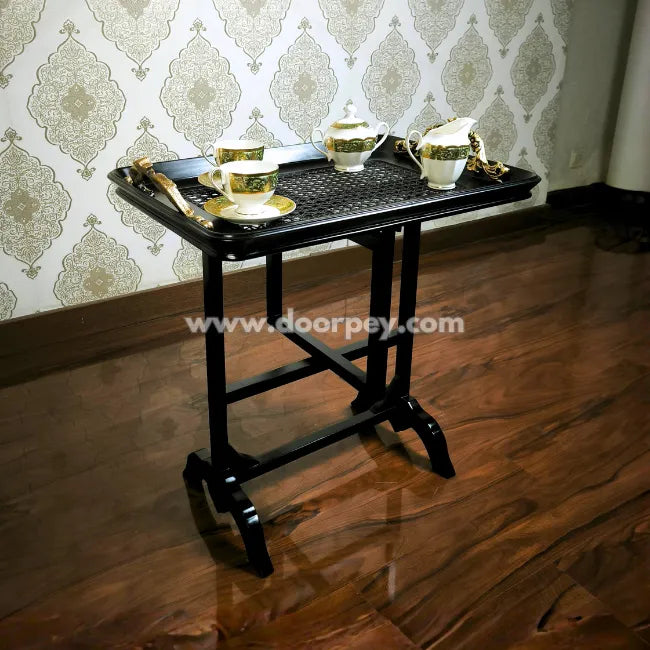 Foldable snack table featuring removable tray top for convenient serving