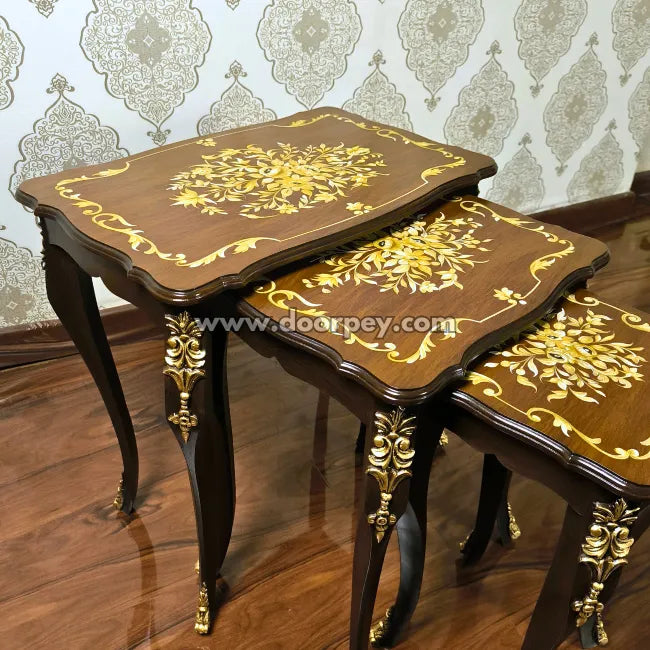 Close up of wooden nesting tables for living and dining room