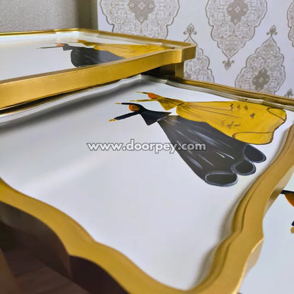 Close up of hand painted wooden nesting tables
